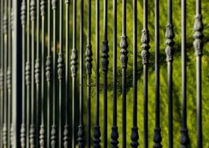 A closeup shot of a black aluminum fence - Golden Gate Fences
