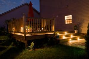 wooden deck at night with lightings on